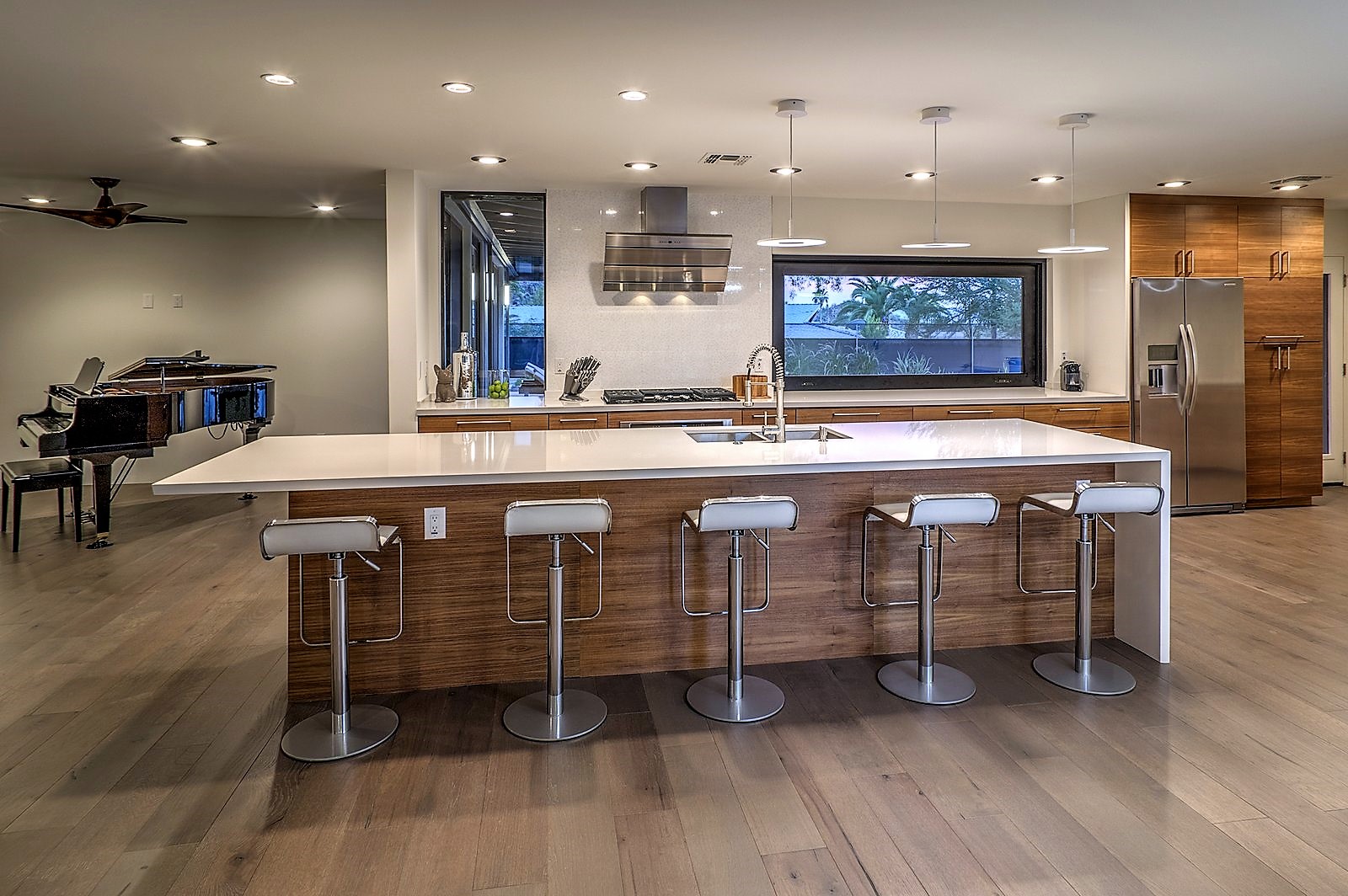 modern-kitchen-with-oversized-center-island-open-to-dining-and-great ...